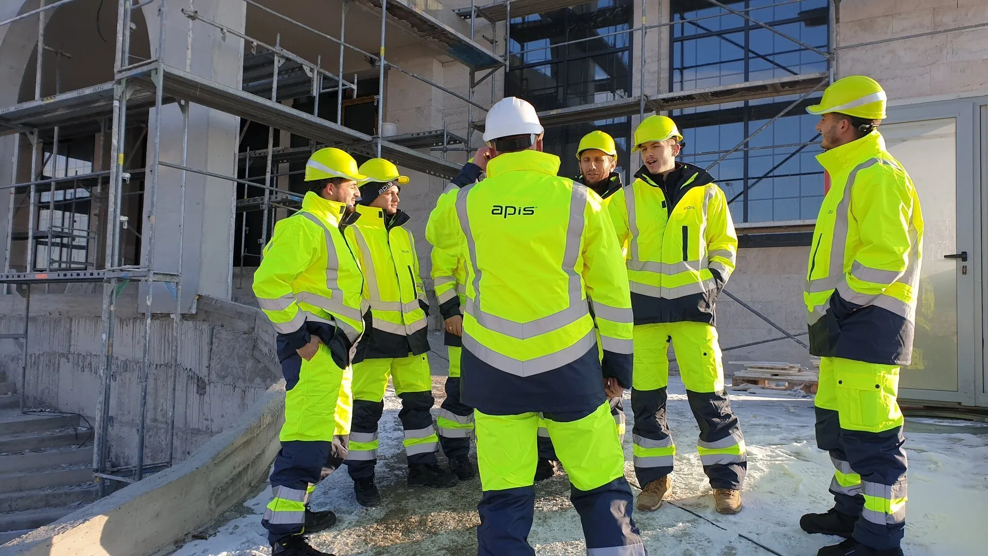 APIS engineering team on site, branded high-vis
